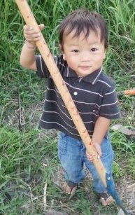 Nepalese boy at the garden project.jpg